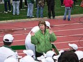 EMU President Dr. Susan Martin conducts the marching band at the 2010 homecoming game against the Ohio Bobcats.