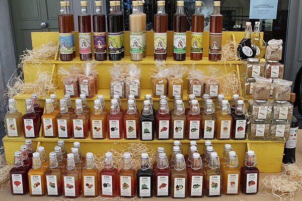 A variety of flavored vinegars, for culinary use, on sale in France