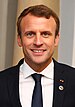 Emmanuel Macron in Tallinn Digital Summit. Welcome dinner hosted by HE Donald Tusk. Handshake (36669381364) (cropped 2).jpg