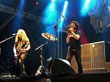 Extreme performing in 2015 Extreme (band) Pat Badger and Kevin Figueiredo Southpark Festival, Finland, 2015.jpg