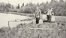Fishery workers stocking a brook near Saranac Lake, New York, 1911 FMIB 42062 Stocking Halfway Brook, Near Saranac Lake.jpeg