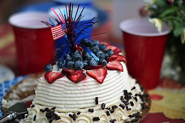 A Fourth of July cake decorated in red, white and blue