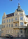 Apartment building in closed development, corner house