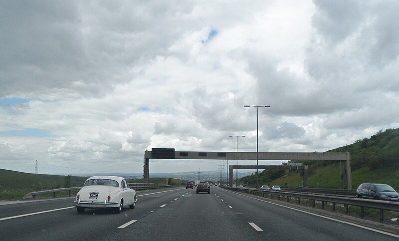 File:Gantries over the M62 - geograph.org.uk - 3524949.jpg