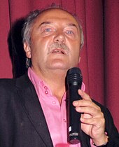 George Galloway speaking in September 2005 George Galloway no2id 29.6.05 (3099288606).jpg