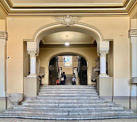 The central stairs of the Constanța History and Archaeology Museum, an example of a Romanian Revival interior