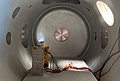 Hall Effect Thruster in a vacuum chamber.jpg