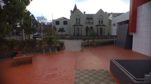 Charles Street entrance to the school, showing Henty House in the background and the Science and Technology Building on the right Henty House at Trinity Grammar.png