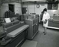 IBM THINK sign at a punched card data processing facility using IBM equipment, circa 1960.