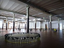 Installation art in a former production room in May 2019 Instalation in der La Fabbrica del-Cioccolato.jpg