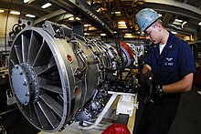 P&W J52-P-408 being worked on in the USS Kitty Hawk's jet shop