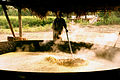 Boiling the sugarcane juice, large scale Jaggery (Gur) making in India.