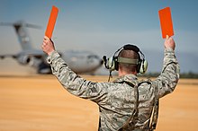 Aircraft marshallers wearing hearing protection Joint Readiness Training Center 140116-F-XL333-018.jpg
