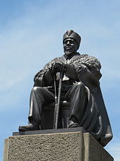 A statue of Kenyatta (1971) by James Butler was erected at the KICC in Nairobi. Jomo Kenyatta Statue 2.JPG