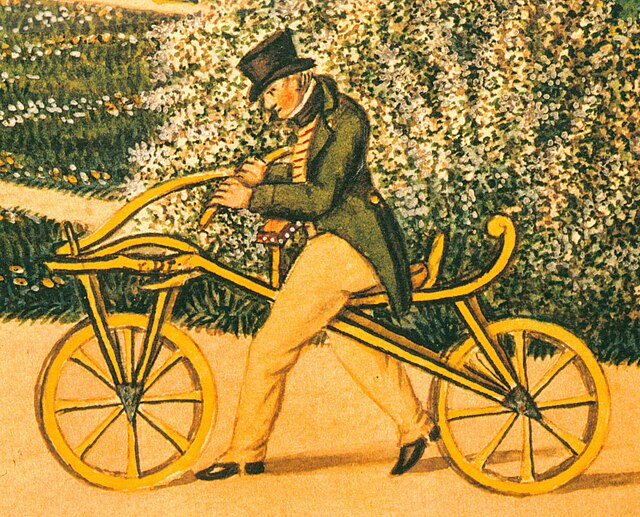 Karl von Drais on his original Laufmaschine, the earliest two-wheeler, or hobbyhorse in 1819