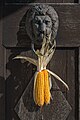 English: Door handle with maize husk at the church portal Deutsch: Türbeschlag mit Maiskolben am Kirchenportal