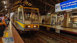 LRT1 2G enters UN station.jpg