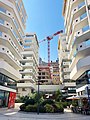 La nouvelle résidence privée Les Jardins d'Apolline, vue de la rue de la Colle, construite par le groupe JB Pastor de 2009 à 2013 (Opération Rainier III). Elle est composée de quatre immeubles d'appartements situés Promenade Honoré II. Cette résidence remplace l'Hôtel Terminus de 1975 et les résidences Les Genévriers, Les Lavandes, et Les Lentisques, toutes construites en 1975 également.