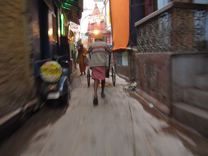 File:Man with pushcart in the old city of Varanasi.JPG