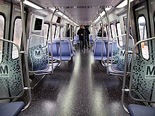 The interior of the 7000 series trains uses a mix of transverse and longitudinal seating. Metro 7000-Series railcar debut 5.jpg