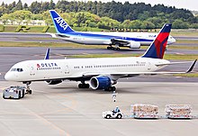 The New Midsize Airplane would have been sized between the 757 (front) and 767 (rear) in the middle of the market N535US (12274798093).jpg