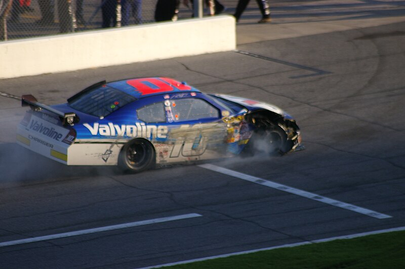 File:Patrick Carpentier blown tire at Gatorade duels (2266469124).jpg