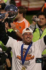 Paul Dalglish celebrates the Dynamo's 2006 MLS Cup win over the Revolution PaulDalglish 2006 MLS Cup trophy.jpg