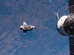 Atlantis approaches the ISS