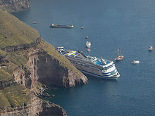 Attempts to prevent the stricken cruise ship from sinking Sea Diamond - Against Rocks.jpg