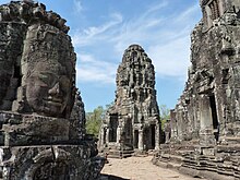 During the course of the 15th century, nearly all of Angkor was abandoned. Stone faces in Bayon, Angkor (3).JPG