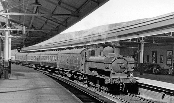 No. 9792 hauling empty stock at Swansea High Street station