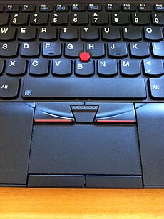 Photograph showing the keyboard and Trackpoint of the X120e model laptop