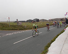 The Tour of Britain riders racing past Salta road end at Dubmill. Tour of Britain at Dubmill, Cumbria.JPG