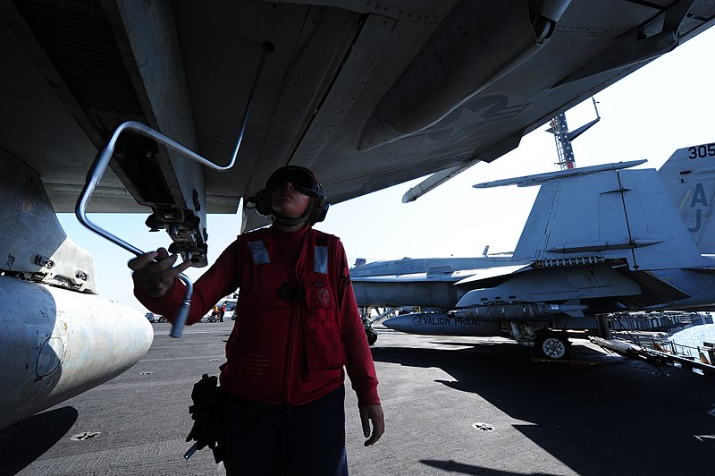 File:U.S. Navy Aviation Ordnanceman 2nd Class Nicolle Morris tightens a bolt on an F-A-18F Super Hornet aircraft assigned to Strike Fighter Squadron (VFA) 213 aboard the aircraft carrier USS George H.W. Bush (CVN 77) 140625-N-CZ979-001.jpg