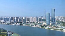 View of Binhai New Area across the Hai River, July 2022.jpg