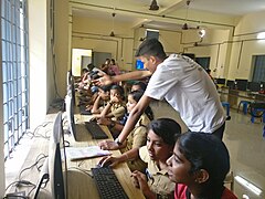 Ambady Anand S giving instructions to students