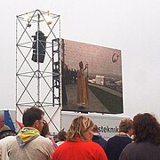 Pilgrims watch Pope Benedict XVI celebrating Mass on big screens Wydscreens.jpg