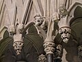 Carvings on the canopies above the seatings