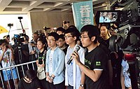 17 August 2017: Nathan Law, Joshua Wong, Alex Chow (L–R) at main entrance of the High Court before sentencing