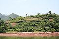 A view from the Yangtze looking at a sign showing the expected water level when the dam is completed. Notice the house and farm will both be under water. More at http://ianandwendy.com/OtherTrips/ChinaVietnamCambodia/China