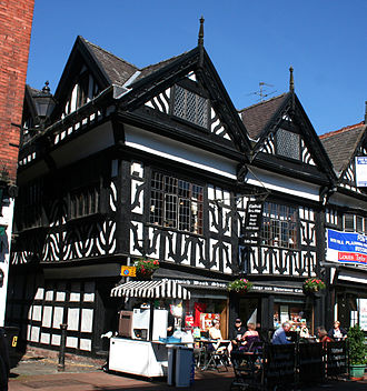 Modern building, with pavement cafe 46 High St, Nantwich.jpg