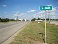 Beyond the Altair sign on US 90A is the Highway 71 junction and the rice dryer, Kallina Dryer Inc. The view is east.