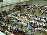 The fursuit parade winds through the Dealers Room (bottom) and Artists Alley