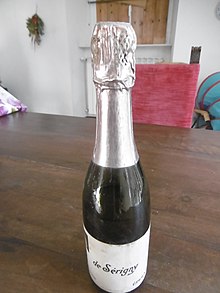 Antica bottiglia Champagne Carte Noire De Serigny Epernay con nota scritta a mano nel 1908 sul retro.jpg