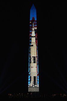 Apollo 11 rocket projected on the Washington Monument