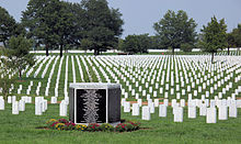 The memorial days before the 10th anniversary of the 9/11 attacks. Arlington National Cemetery - 9-11 Memorial to Pentagon Victims - SW side with tombstones - 2011.jpg