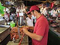 Baliuageño market vendors processing Bulacan Longaniza 06