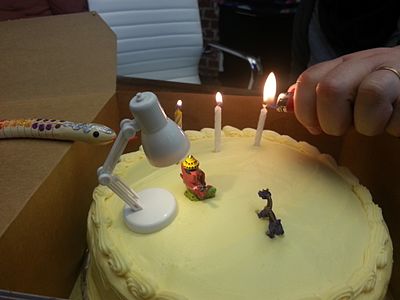 Day 46: Birthday cake with Ganesh figurine and toy lamp