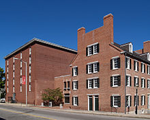 One of the last remaining textile mill boarding houses in Lowell, Massachusetts on right, part of the Lowell National Historical Park Boott Boardinghouse Store.jpg