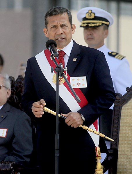 Former president Ollanta Humala using the presidential sash, plaque and baton